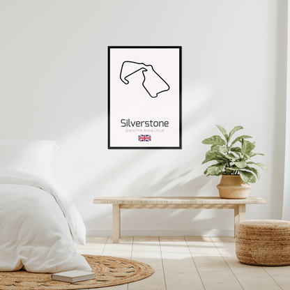 Silverstone black-framed print in a bright bedroom