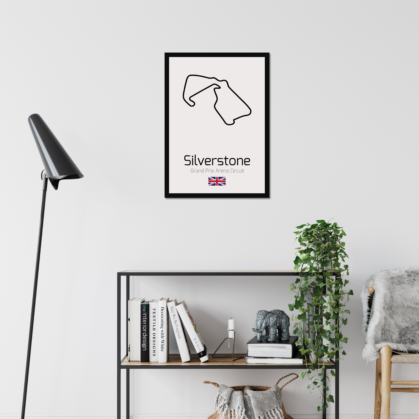 Silverstone black-framed print above a shelving unit
