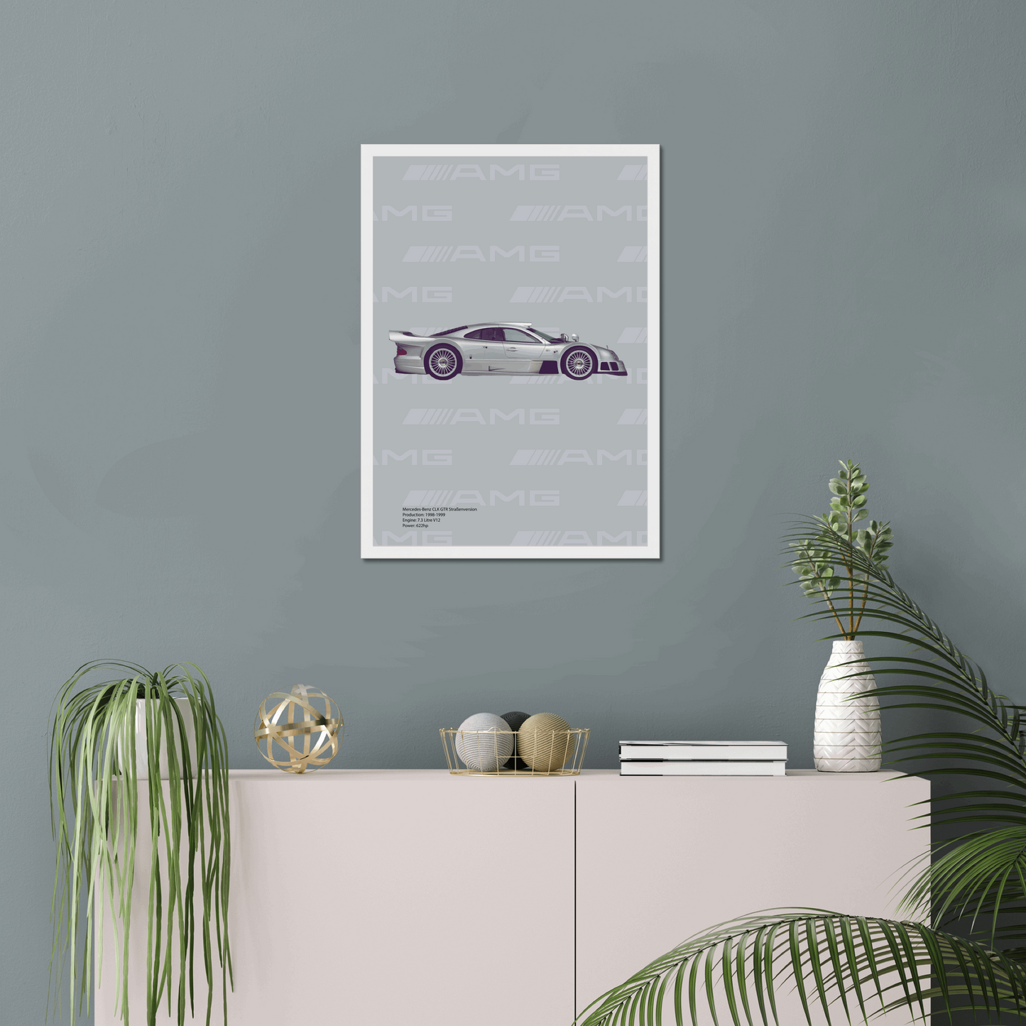 White-framed CLK GTR print in a plant-filled room
