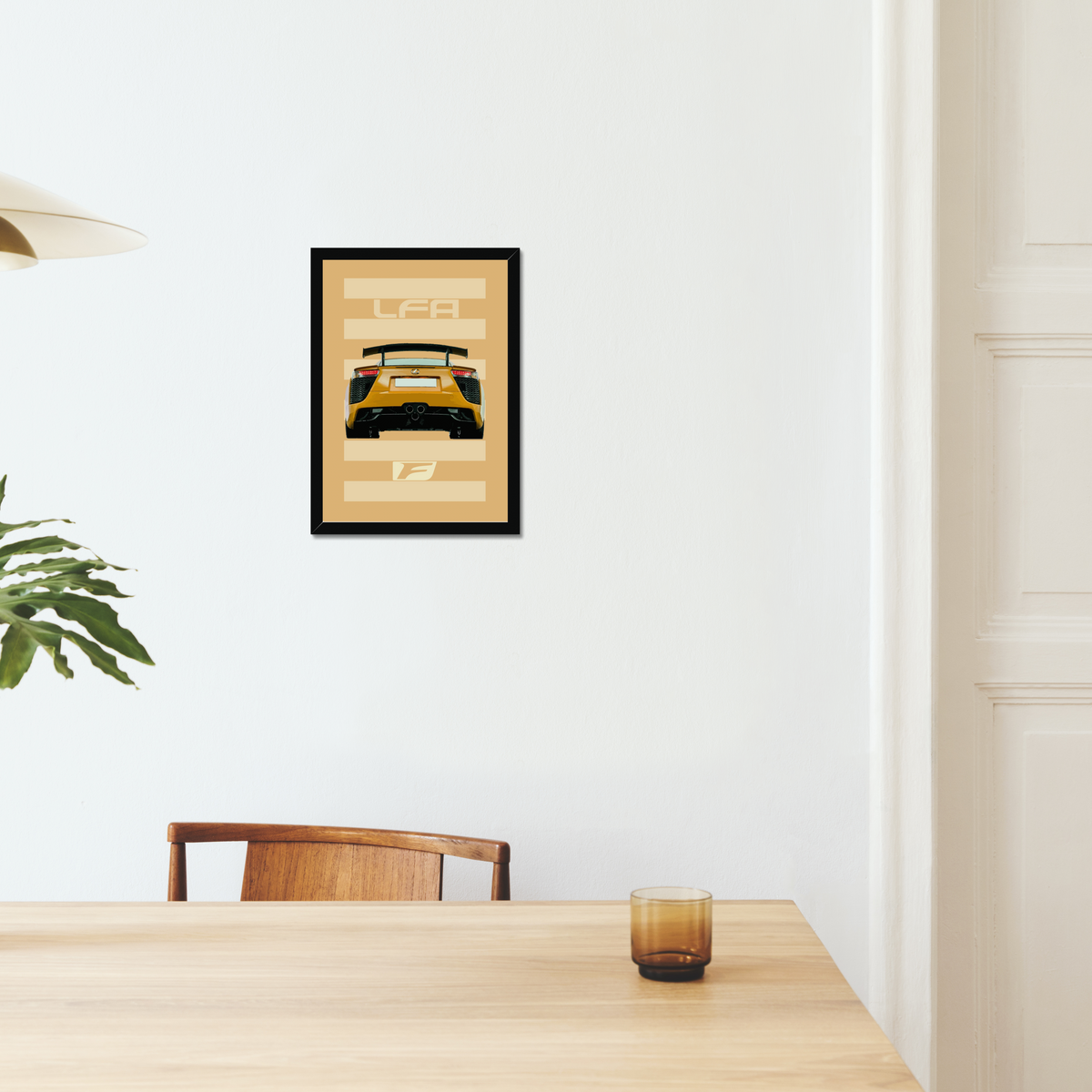 Lexus LFA artwork displayed above a dining table