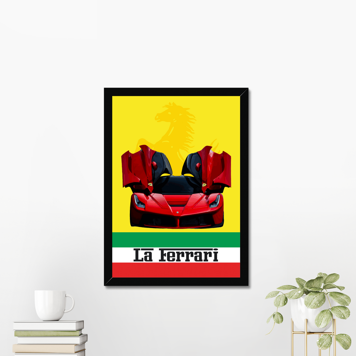 Black-framed LaFerrari artwork beside books and greenery