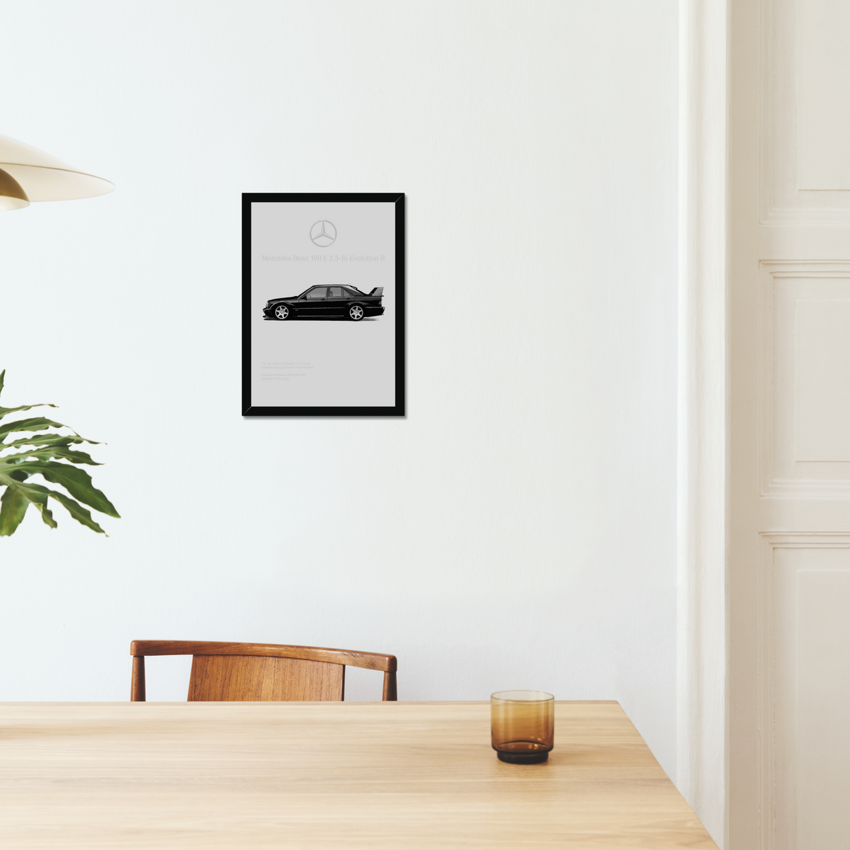 Mercedes 190E Evo II artwork above a dining table